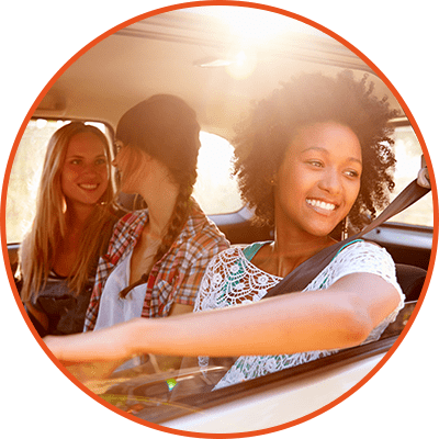 young girl in car happy 