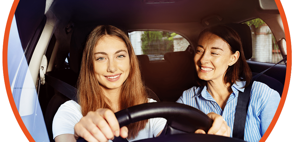Girl and mum driving in car