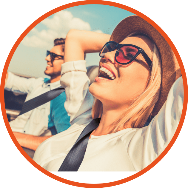 couple driving in summer